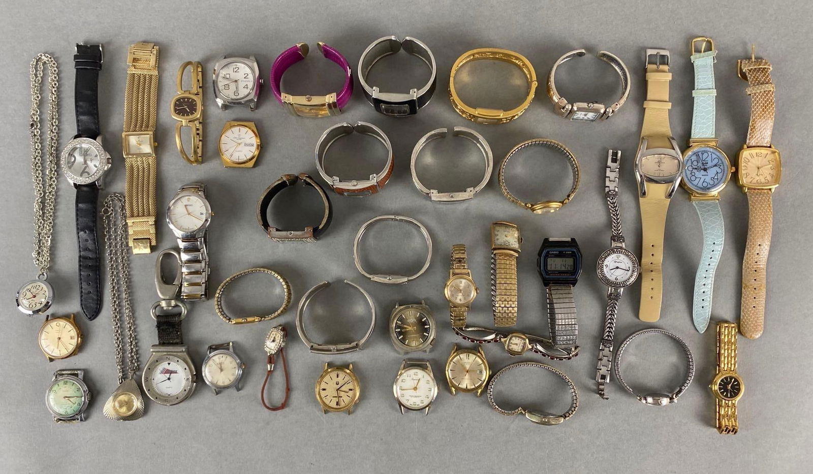 Group of 30+ Womens Wristwatches and More: Unknown working condition, Some for parts only, Includes Brighton, Geneva, Fossil, Timex, and more, Some broken or missing pieces.