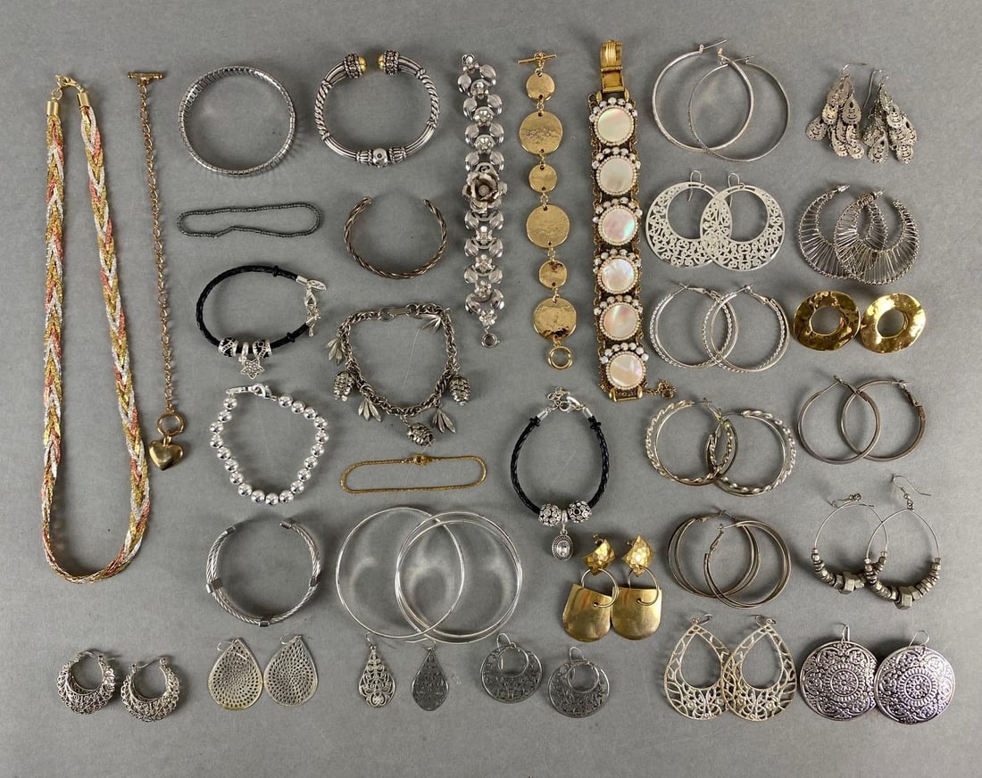 Group of 30+ Costume Jewelry Earrings and More: Includes earrings, bracelets, necklace, and more, Earrings all for pierced ears, Necklace measures 22 inches long.