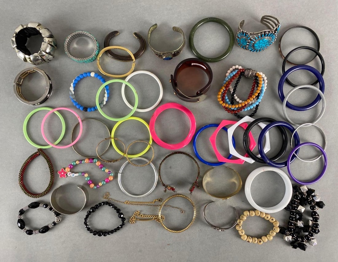 Group of 40+ Costume Jewelry Bracelets: Includes bangles, cuff bracelets, beaded, and more.