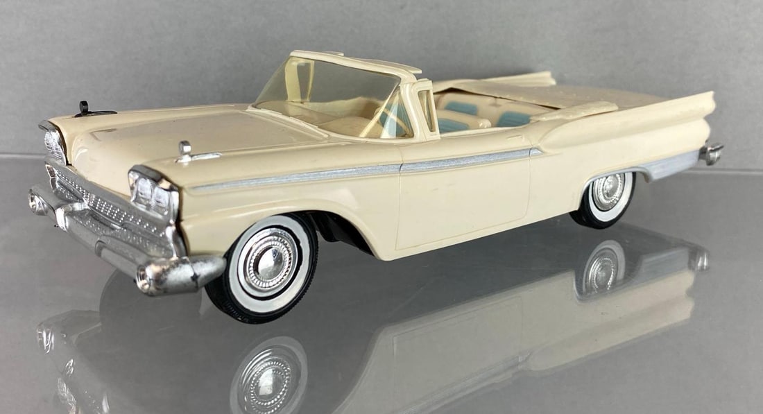 1959 Ford Fairlane 500 Sunliner Convertible Dealership Promo Car: Ivory with baby blue accent interior, working condition, some chrome rubbing off throughout, slight warping of interior, some scratches underneath