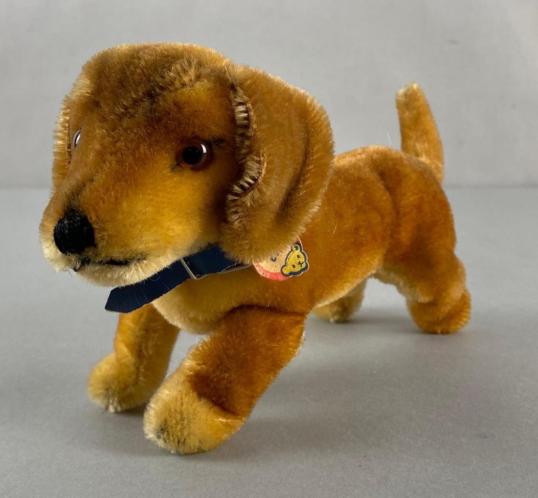 Steiff Dachshund Bazi Dog: Made in Germany, Measures 5 1/2 x 9 1/2 x 3 1/2 inches.