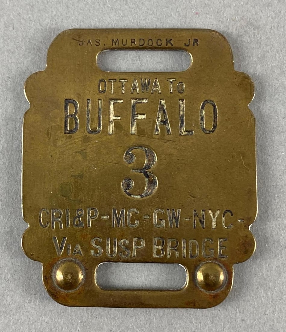 CRI&P Buffalo to Ottawa Brass Luggage Tag: Chicago, Road Island, and Pacific Railroad, Round trip luggage tag, Measures 2 x 1 1/2 inches.