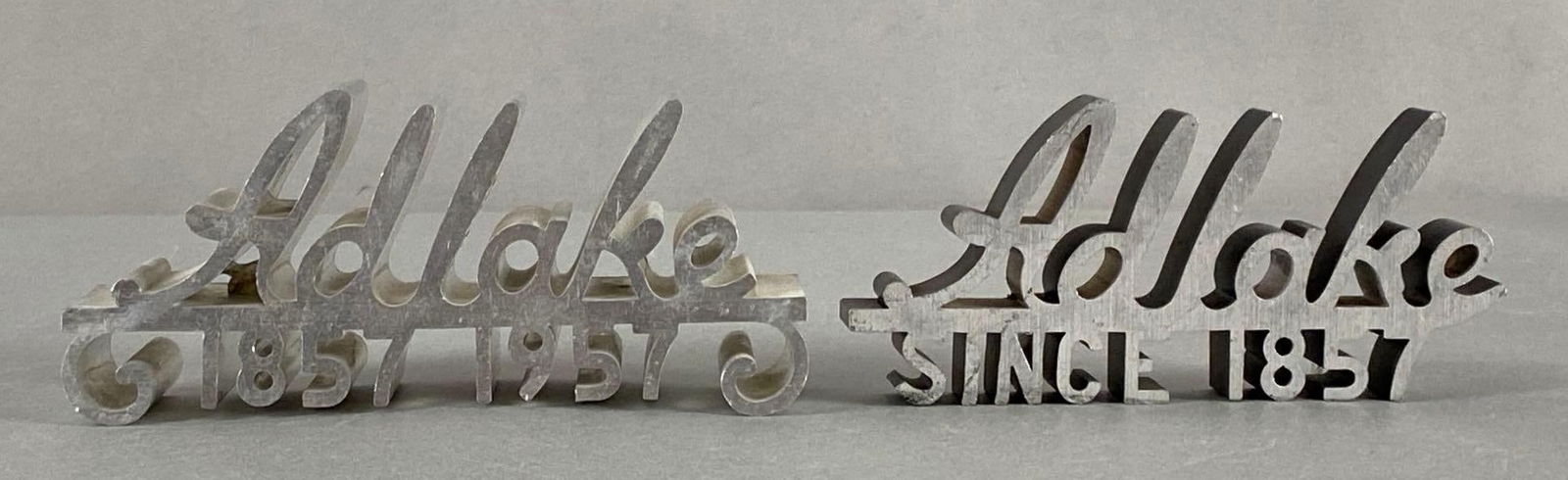 Group of 2 Adlake Railroad Aluminum Advertising Paperweights (1 of 4)