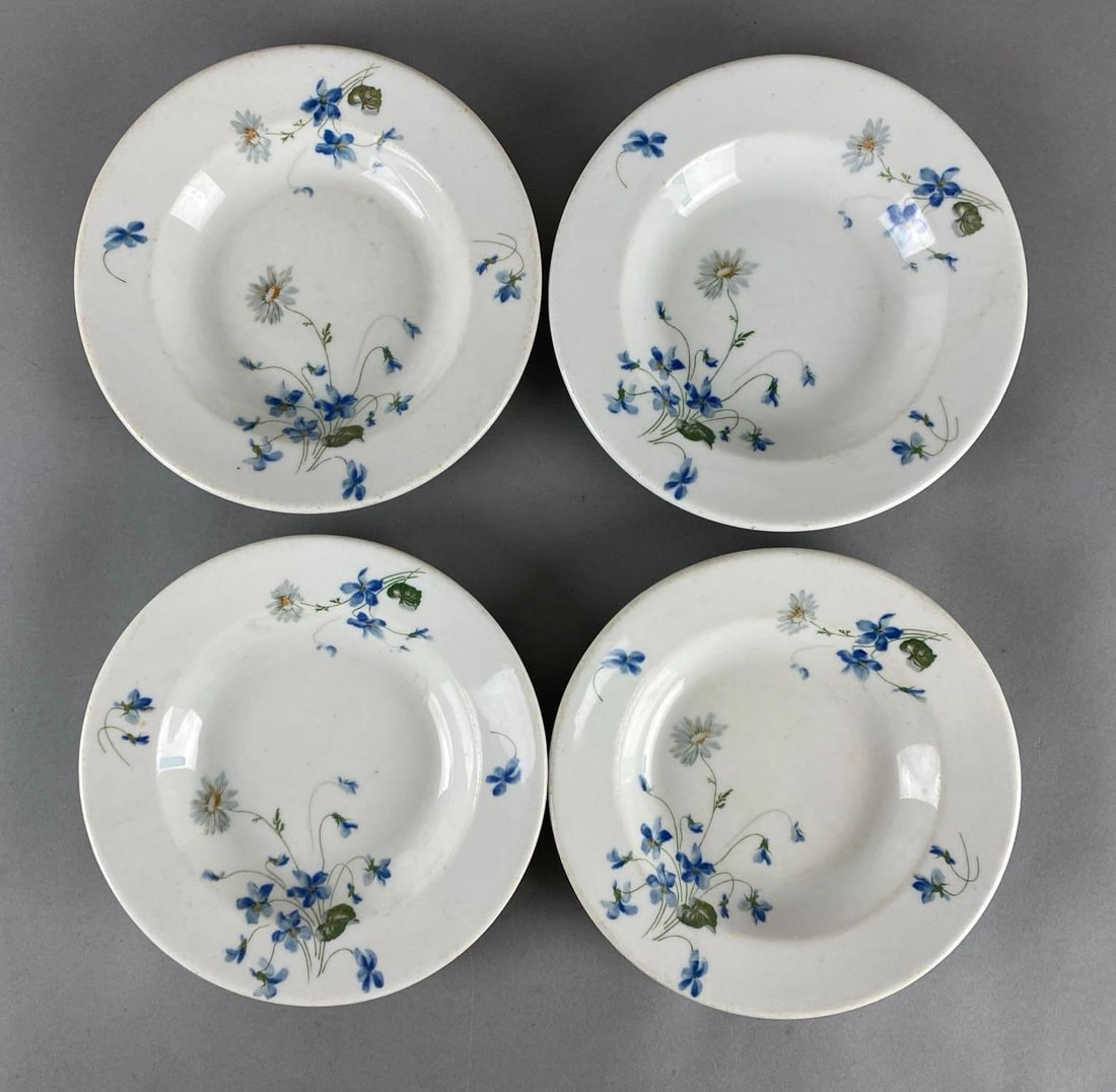 Group of 4 CB&Q Railroad Violets and Daisies Porcelain Plates: Chicago, Burlington, and Quincy, Syracuse, Some small cracks and chips along bases, Largest measures 8 x 8 x 1 1/2 inches.