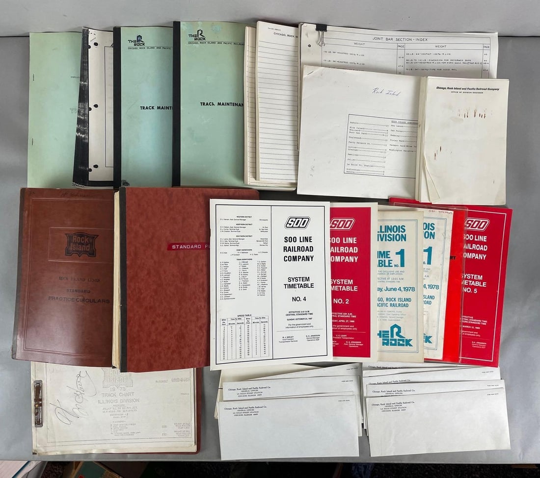 Group of 20+ Railroad Timetables and Ephemera: Includes rock island track chart, maintenance logs, stationary, the rock, SOO, and more. Largest measures 8 1/2 x 14 inches