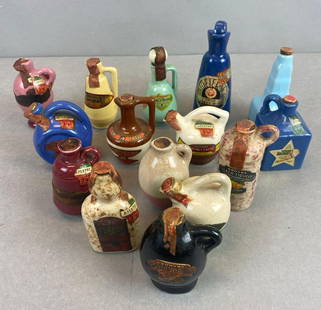 Group of 15 Stoneware Liqueur and Syrup Jugs and Bottles: all empty, largest measures 5 x 2 1/4 x 1 3/4 inches