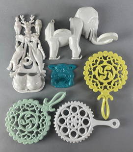 Group of 6 Enameled Cast Iron Trivets and More: Includes aluminum moormans spatula holder, deer item is broken at top. Largest trivet measures 9 1/4 x 6 inches