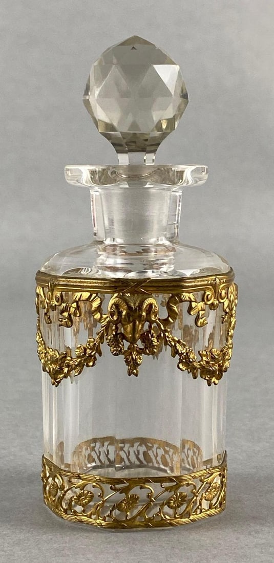 Clear Glass Perfume Bottle with Gilt Metal Rams Head Casing (1 of 7)