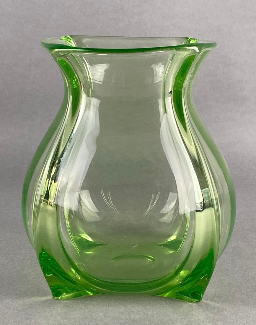 Vintage Uranium Glass Footed Vase: Some fleabites on feet, Reactive to UV lights, Measures 7 1/4 x 6 x 6 inches.