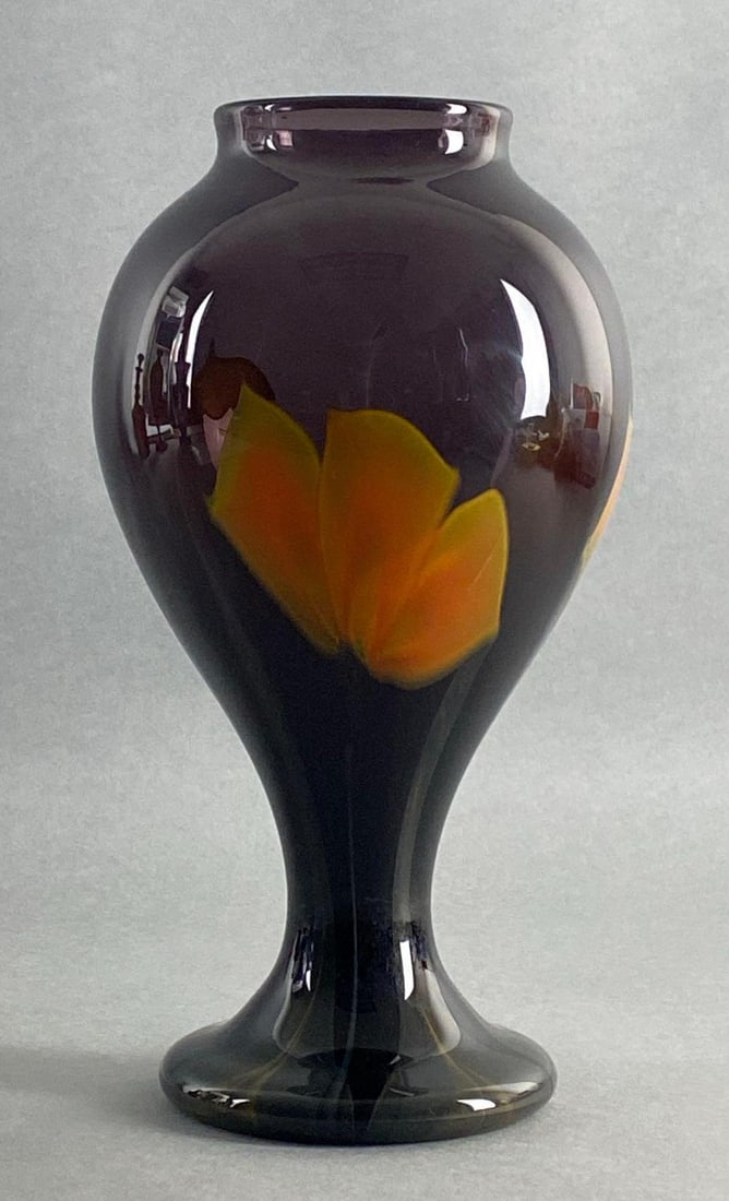 2007 Smallhouse Amethyst Art Glass Vase: With pulled orange glass patterning, Makers name etched on base, Measures 10 3/4 x 5 1/2 x 5 1/2 inches.