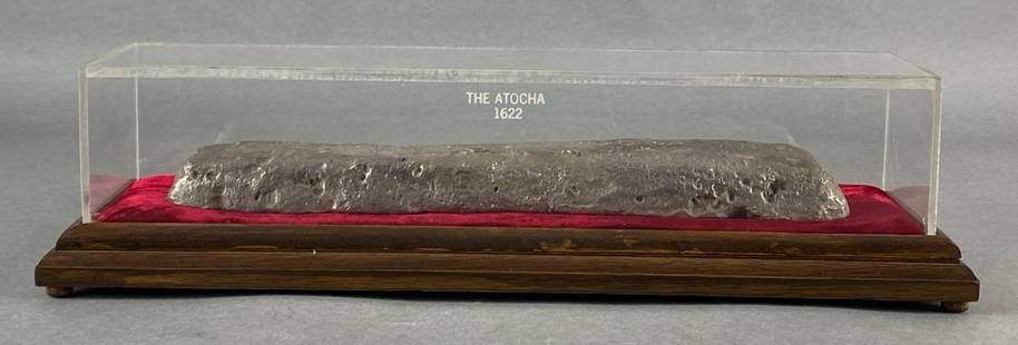 Large Silver Ingot Recovered from the Spanish Atocha Shipwreck: With COA, 14 Troy Pounds, 1.6 Troy Oz, Carat: 2380, TSI Number: 85A-S924, Tag Number: 1100, Nuestra Senora De Atocha sank in 1622, Ingot recovered in 1985 by Treasure Salvors, With display case, Case