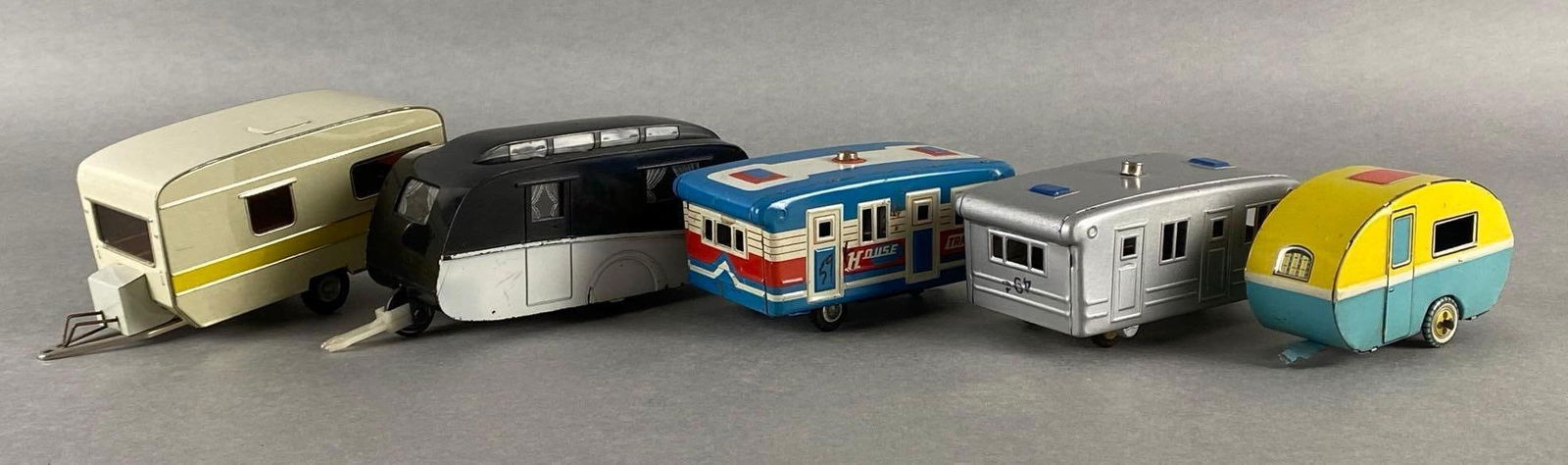 Group of 5 Die-Cast and Plastic Trailer Caravans: Includes CK, OK, and mor, Largest measures 3 x 7 x 2 1/4 inches.