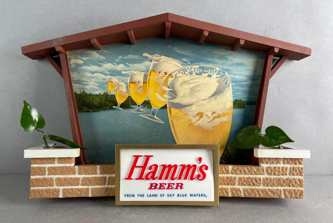 Vintage Hamms Beer Flying Goblets Light Up Advertising Sign: 1960s, working condition. Crack on roof. Measures 12 1/4 x 20 x 5 1/2 inches