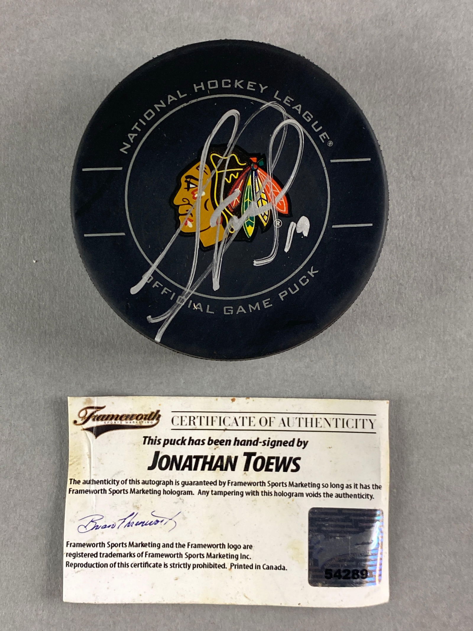 Jonathan Toews Signed Chicago Blackhawks Hockey Puck with COA (1 of 2)