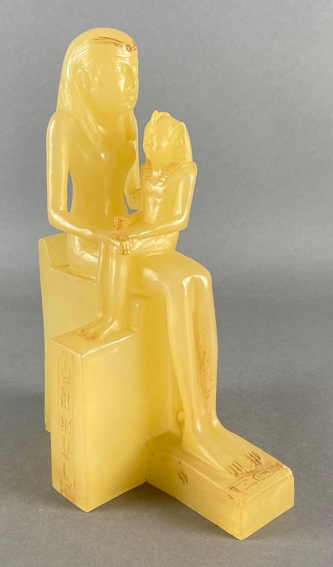 Egyptian Queen Ankhnes Meryre II and her son Pepi II Resin Statue: Measures 10 3/4 x 7 x 4 inches.