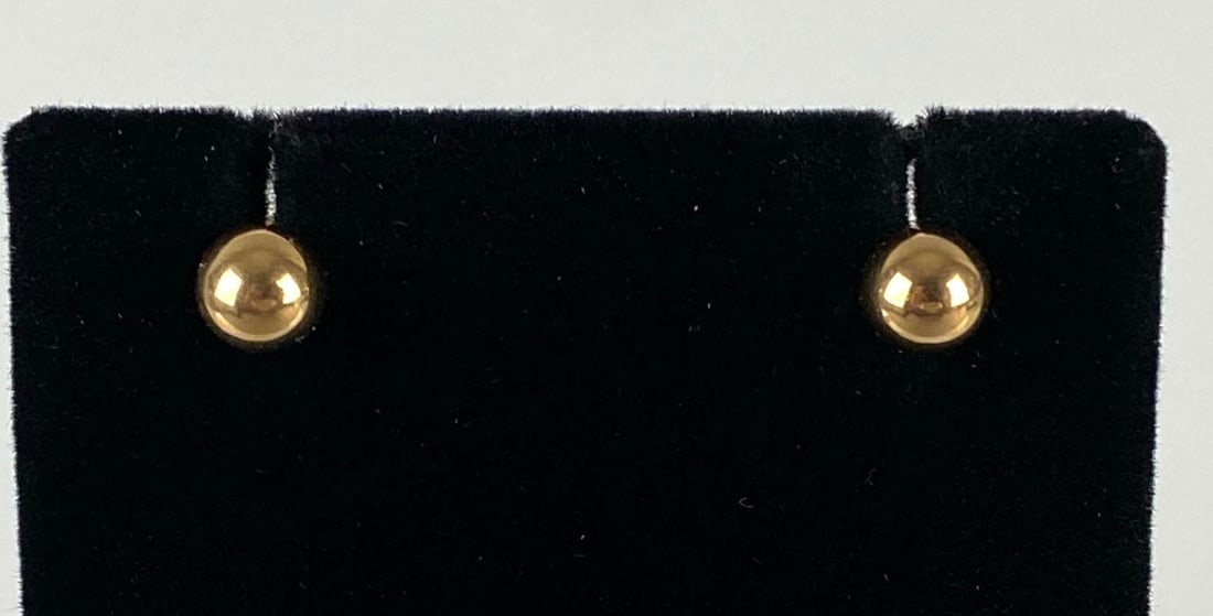 Pair of 14K Gold Stud Earrings: Total weight 0.5g, Stand not included, Measures 1/4 inches in diameter.