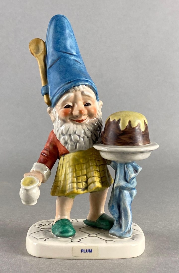 Goebel Co-Boy Plum Pastry Porcelain Gnome Figurine: 1970, Made in West Germany, Measures 8 1/2 x 4 1/4 x 3 inches.