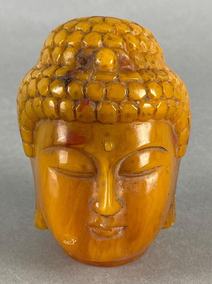 Butterscotch Bakelite Buddha Figure Head: Measures 3 1/2 x 2 3/4 x 3 1/4 inches.