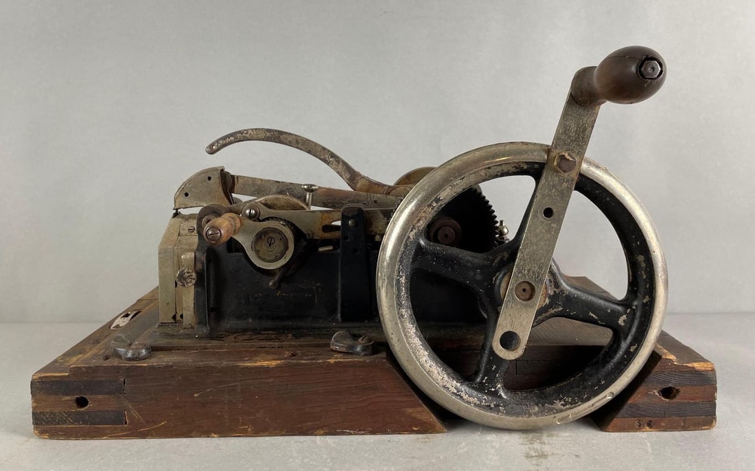 Antique Gritzner Leather Sewing Machine: No. 3577, measures 21 1/4 x 11 1/2 x 12 1/2 inches