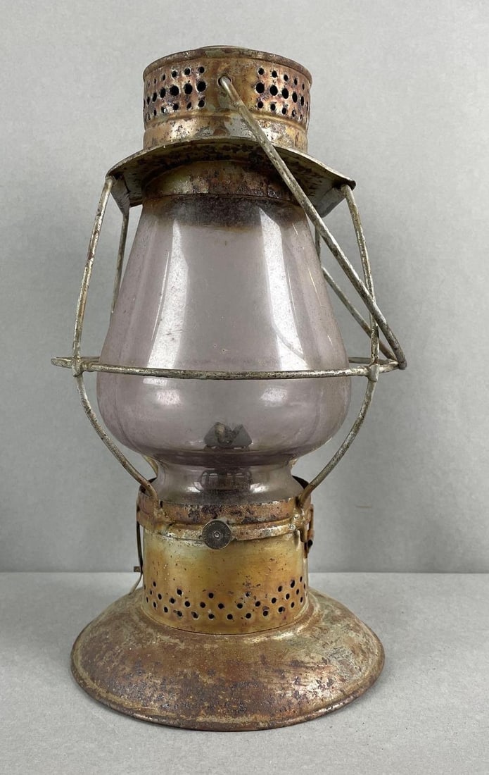 Antique Railroad Oil Lantern: Benedict and Burnham dial, globe cracked. Measures 11 x 5 3/4 inches without handle