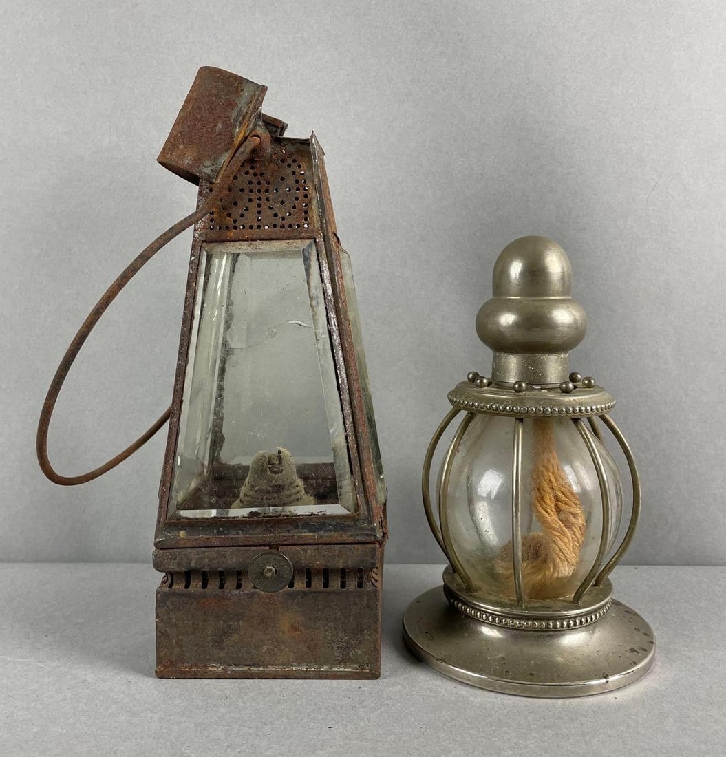 Group of 2 Vintage Oil Lanterns: 2 Cracked glass panels on taller, measures 9 x 3 1/4 x 3 1/4 inches without handle