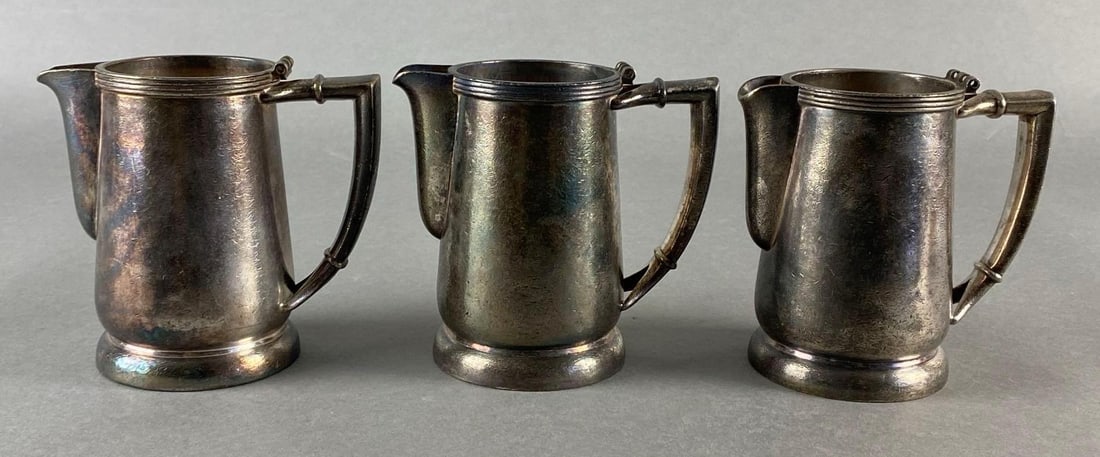 Group of 3 Chesapeake & Ohio Railroad Silver Soldered Creamers: 1947, All 11oz, International Silver Co, All missing lids, All measure 4 1/2 x 4 3/4 x 3 inches.