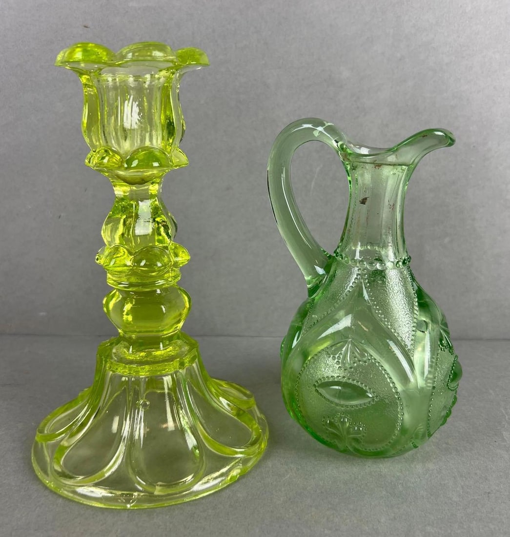 Group of 2 Vaseline Glass items: Include candlestick and cruet, candlestick measure 7 x 4 1/2 inches
