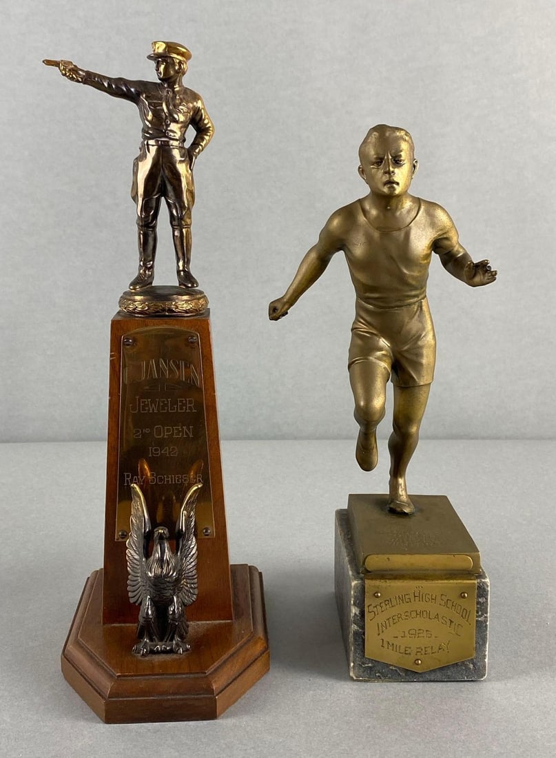 Group of 2 Vintage Trophies: Includes 1926 Sterling High School Interscholastic 1 Mille Relay, and 1942 C. Jansen Jeweler 2nd Open, Runner missing middle finger, Tallest measures 12 x 4 x 6 inches.