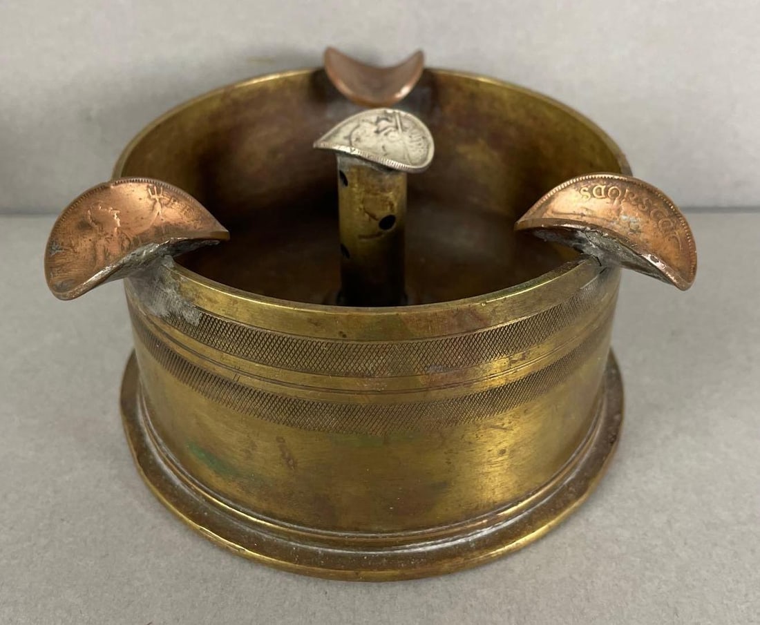 1943 WW2 50 Cal Trench Art Ashtray: Foreign Coins for cigarette rests. Measures 2 1/2 x 4 1/2 inches