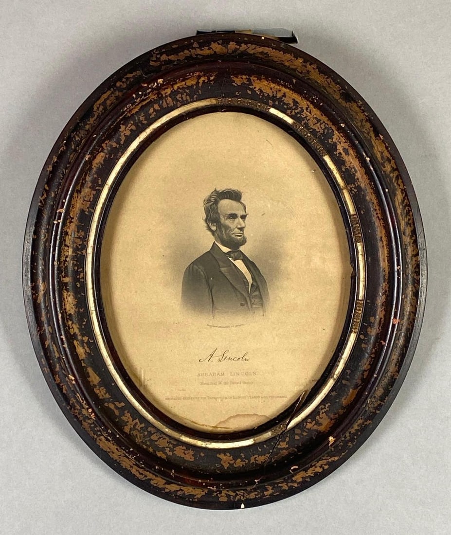 Western Engraving Co. President Abraham Lincoln Engraving: Engraved for Patriotism of Illinois Clarke and Co. Publishers, Split along bottom of frame, Some moisture damage along bottom edge, Frame measures 12 1/2 x 10 3/4 inches, Portrait measures 9 x 7 inche