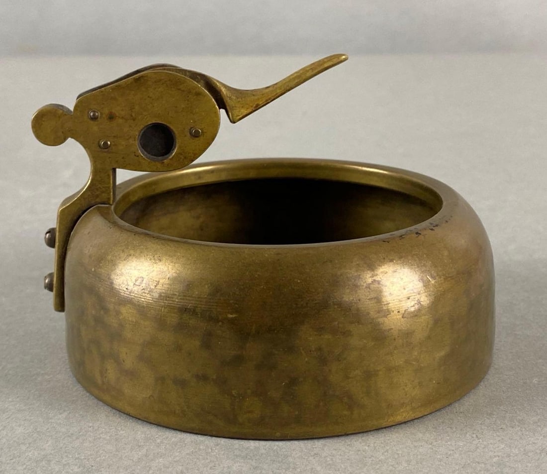 Hammered Brass Cigar Cutter Ashtray: Made in Germany, Measures 3 x 4 1/4 x 4 inches.