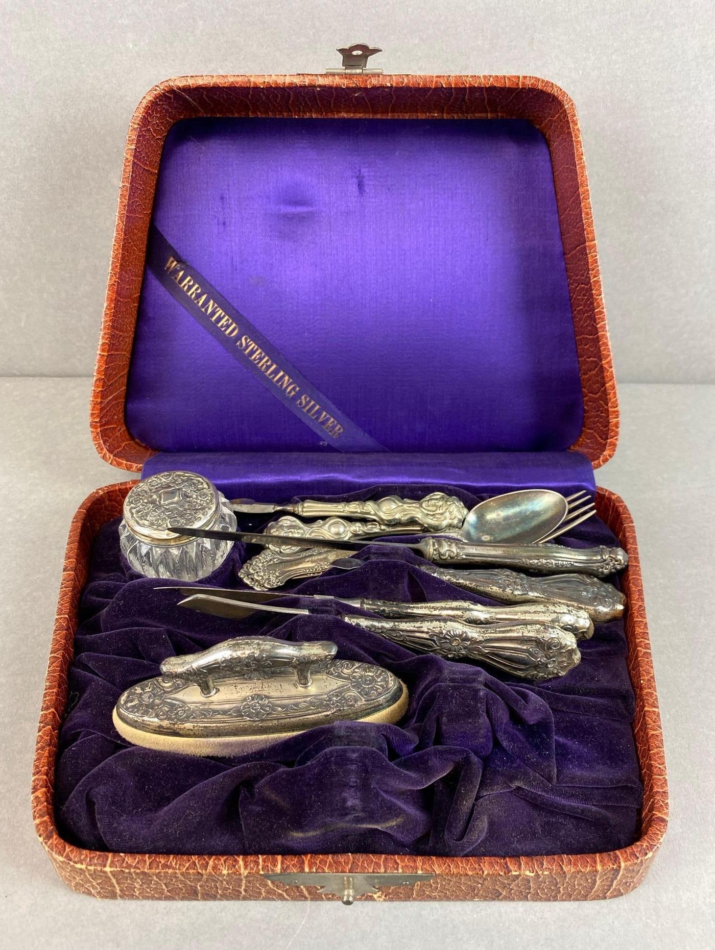 5 Piece Sterling Silver Vanity Set and 5 Pieces of Silveroin Flatware: includes fork, knifes, brush and more, box measures 3 x 9 1/2 x 7 inches