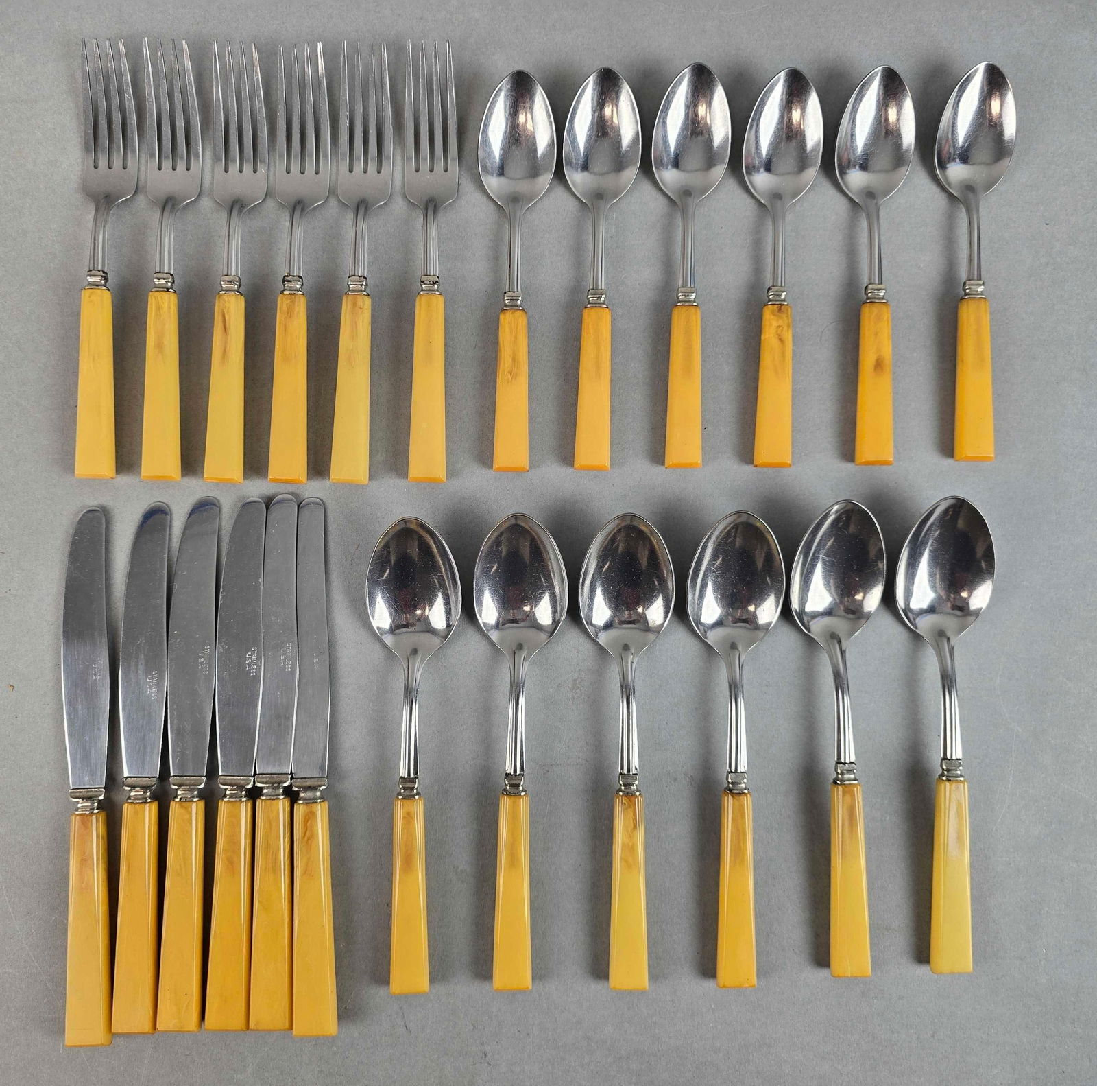 Group of 20+ Vintage Yellow Bakelite Flatware: Knifes measures 8 1/2 inches in length