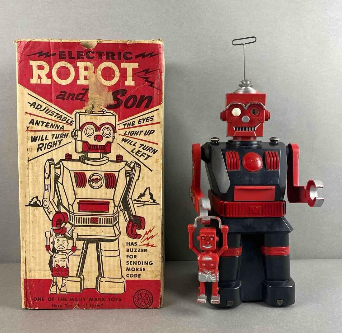 Marx Electric Robot and Son Plastic Toy: Light up and makes noise, wheels in working condition, Includes original box, unknown set completion, box measures 16 1/4 x 8 1/2 x 7 1/2 inches