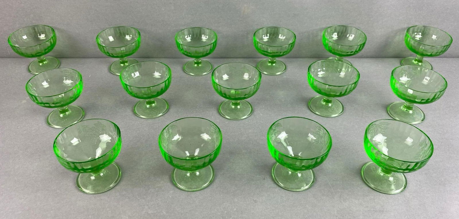 Group of 15 Green Cherry Blossom Uranium Depression Glass Sherbets: glows Under blacklight, each measures 3 x 3 1/2 x 3 1/2 inches