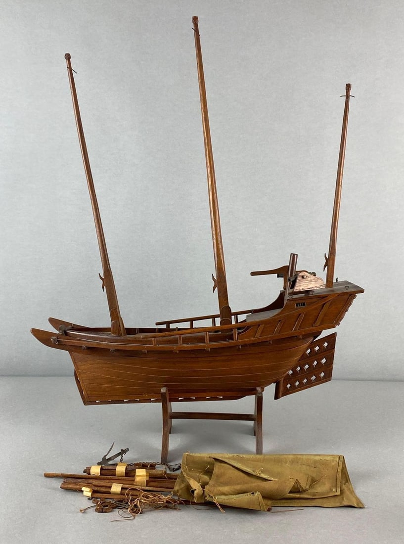 Chinese Junk Ship Model: Includes cannons, sails, anchor, and more, Unknown set completion, Ship measures 26 x 19 1/2 x 6 inches on stand.