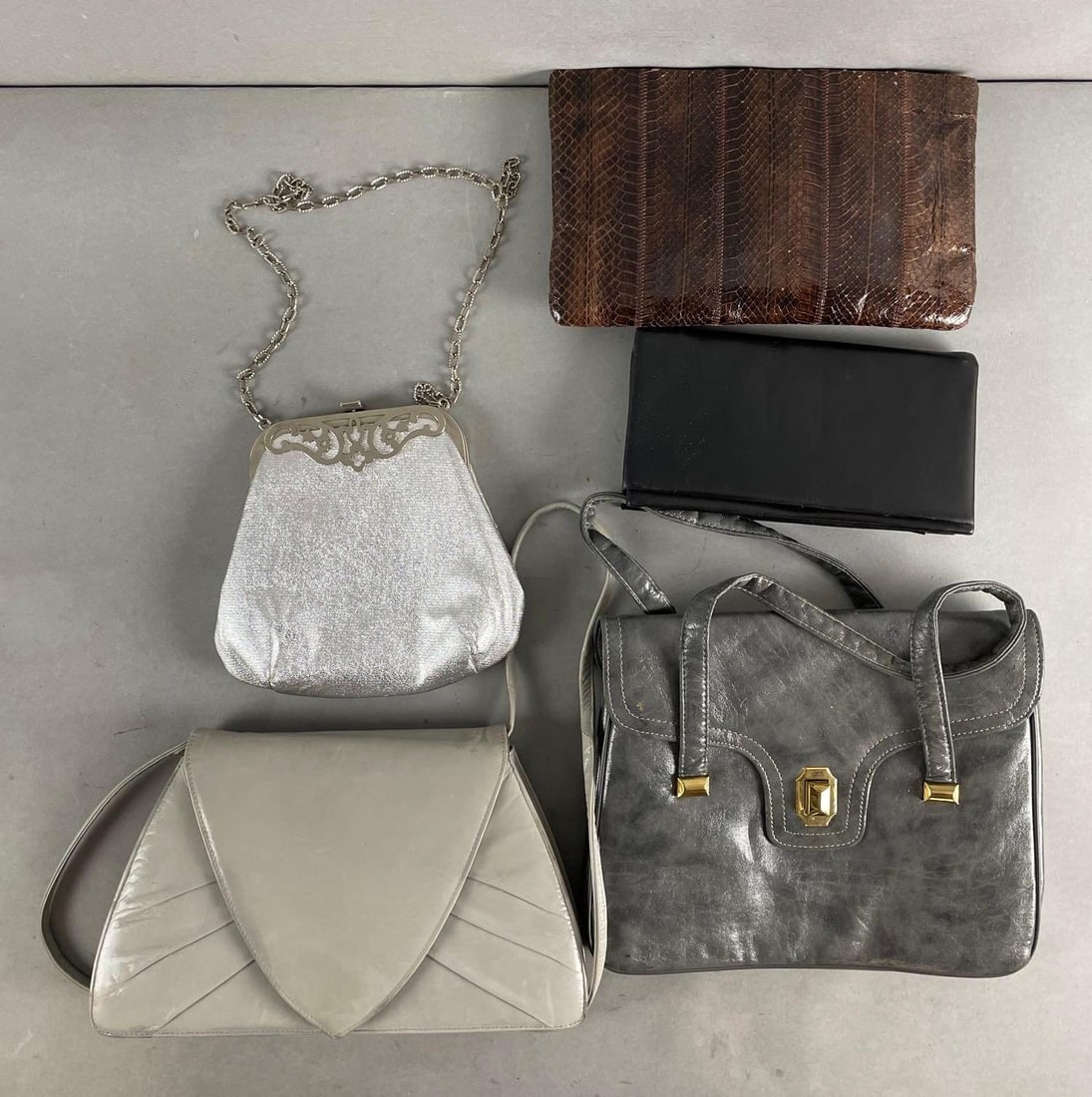 Group of 5 Purses: Includes snakeskin brown clutch, Joseph gray purse, largest measures 9 x 11 inches