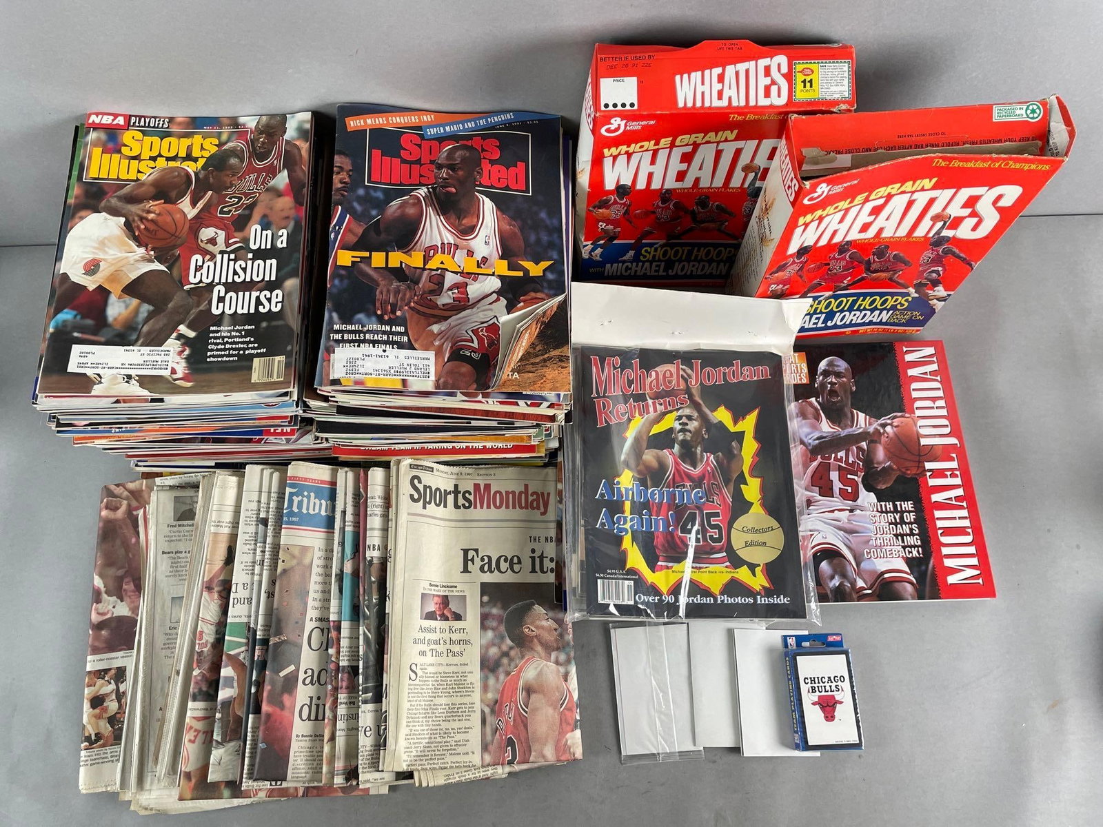 Large Group of Michael Jordan Ephemera and More: Includes Sports Illustrated covers, wheaties boxes, one sealed, newspapers. Not all SI covers are Jordan