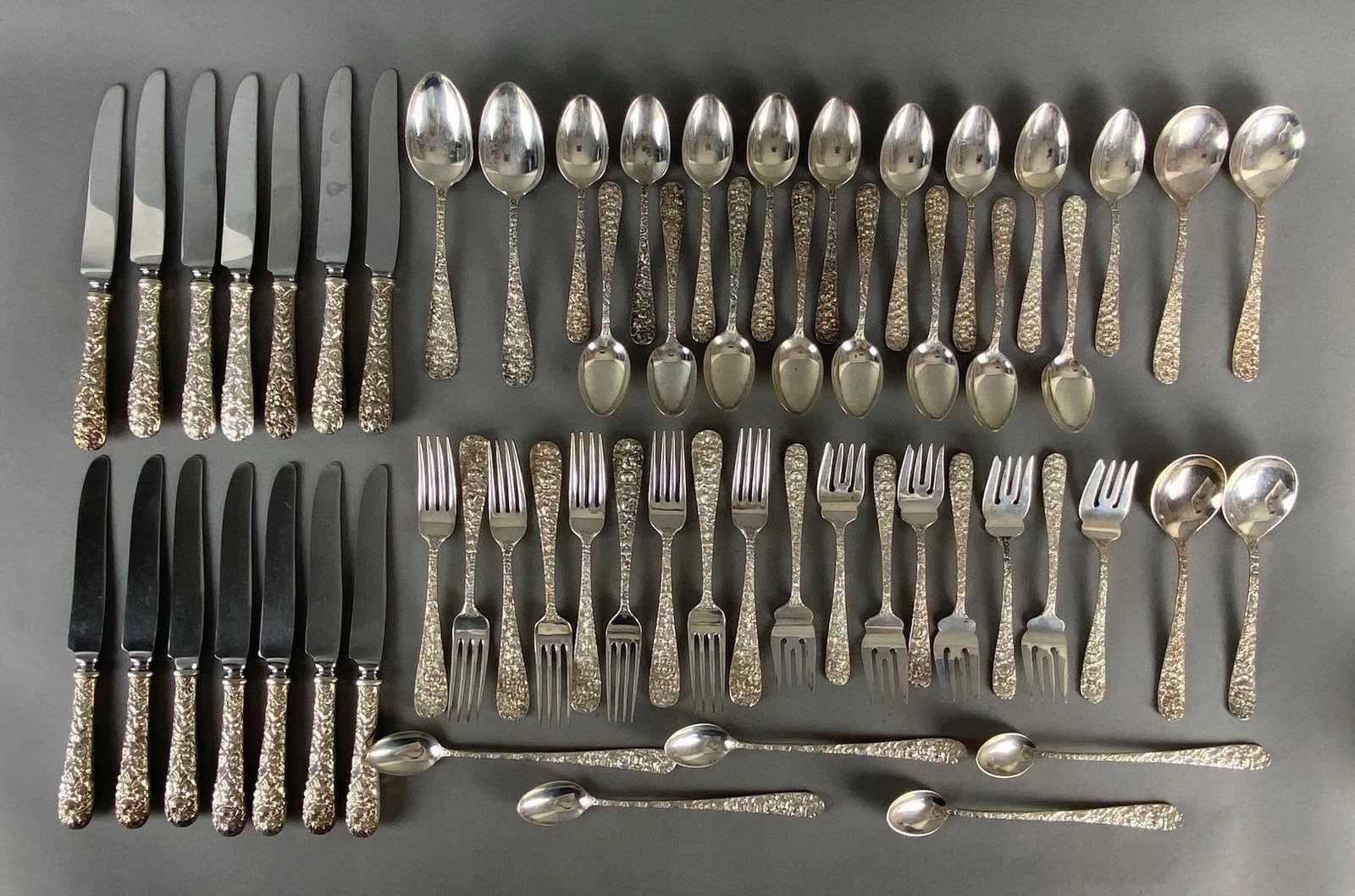 59 Piece Stieff Repousse Sterling Silver Flatware Set: Forks weigh 786.8g total, Spoons weigh 1065.0g total, Includes (14) Knives, (9) Dinner Forks, (8) Forks, (2) Large Spoons, (4) Soup Spoons, (5) Stirring Spoons, and (17) Dinner Spoons, Longest measure