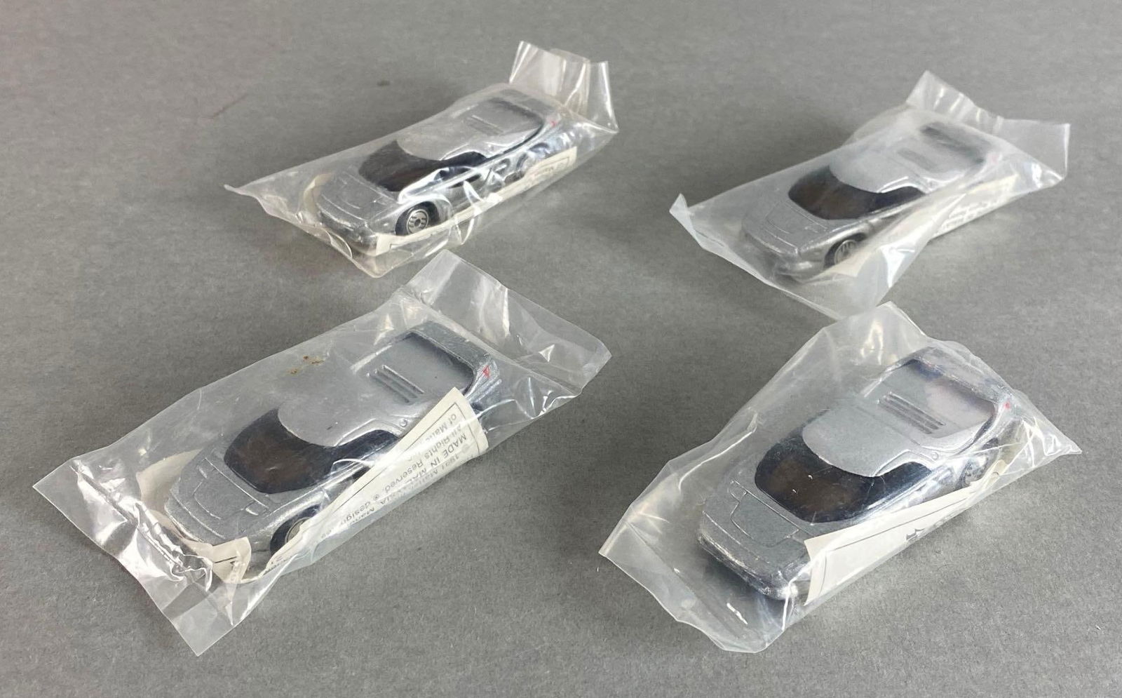 Group of 4 Rare Hot Wheels Vector Avtech Wx3 Die-Cast Vehicles: 1991, Metallic Silver, like new in original packaging