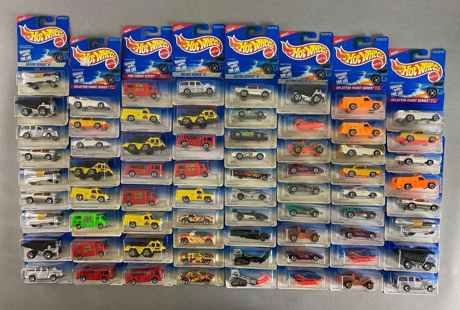 Group of 60+ Mattel Hot Wheels Die-Cast Vehicles: Includes splatter paint series, fire squad series, fast food series and more, new in original packaging