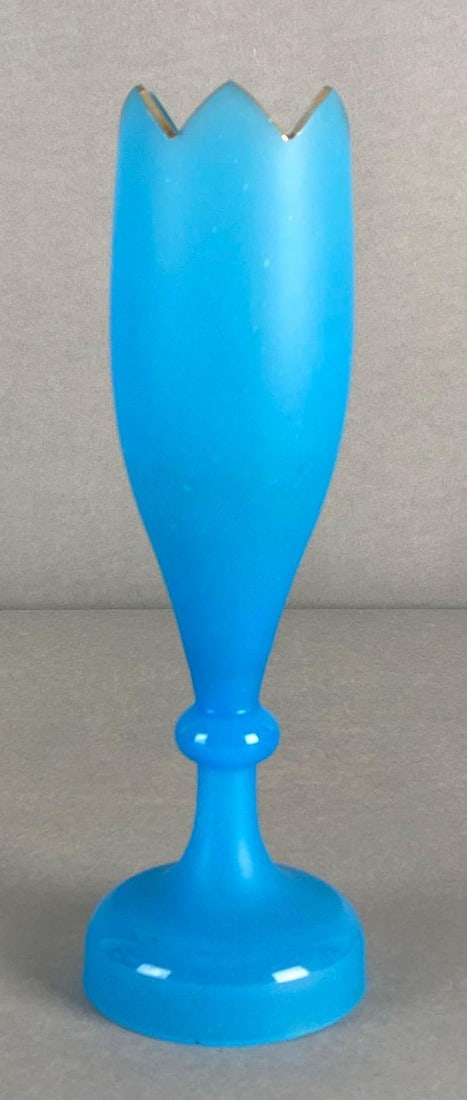 Blue Opaline Glass Footed Vase: Gold gilt painted accent on top rim, Measures 10 3/4 x 3 1/2 x 3 1/2 inches.