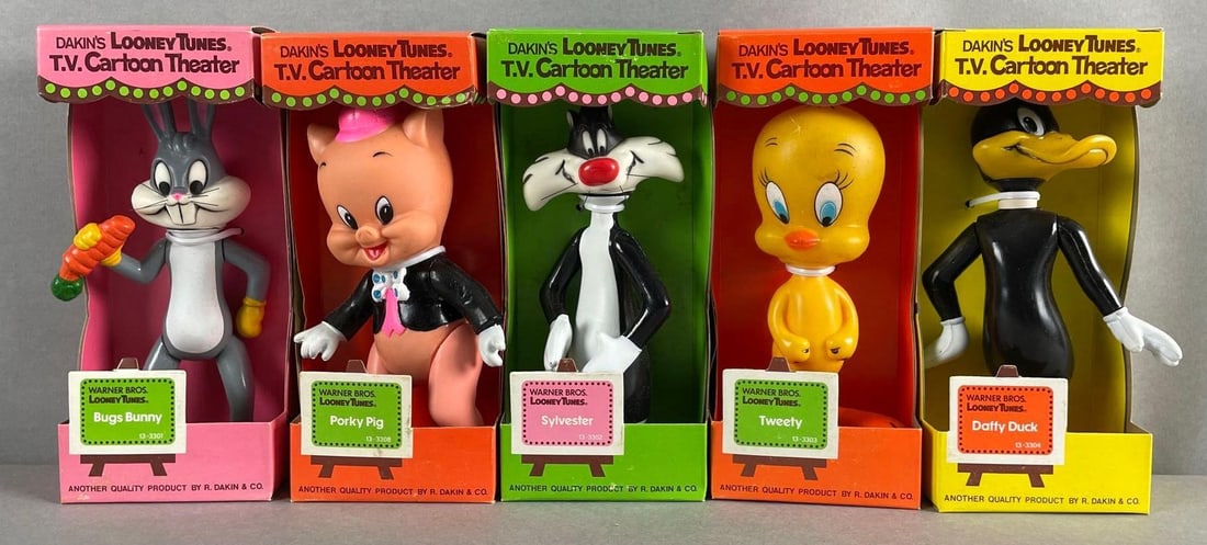 Group of 5 Dakin Cartoon Theater Looney Tunes Figures: Set of five vintage 1976 dakin figurines each in their original boxes. Set includes Bugs Bunny, Tweety, Sylvester, porky pig, and daffy duck. Each measures 7 inches tall.