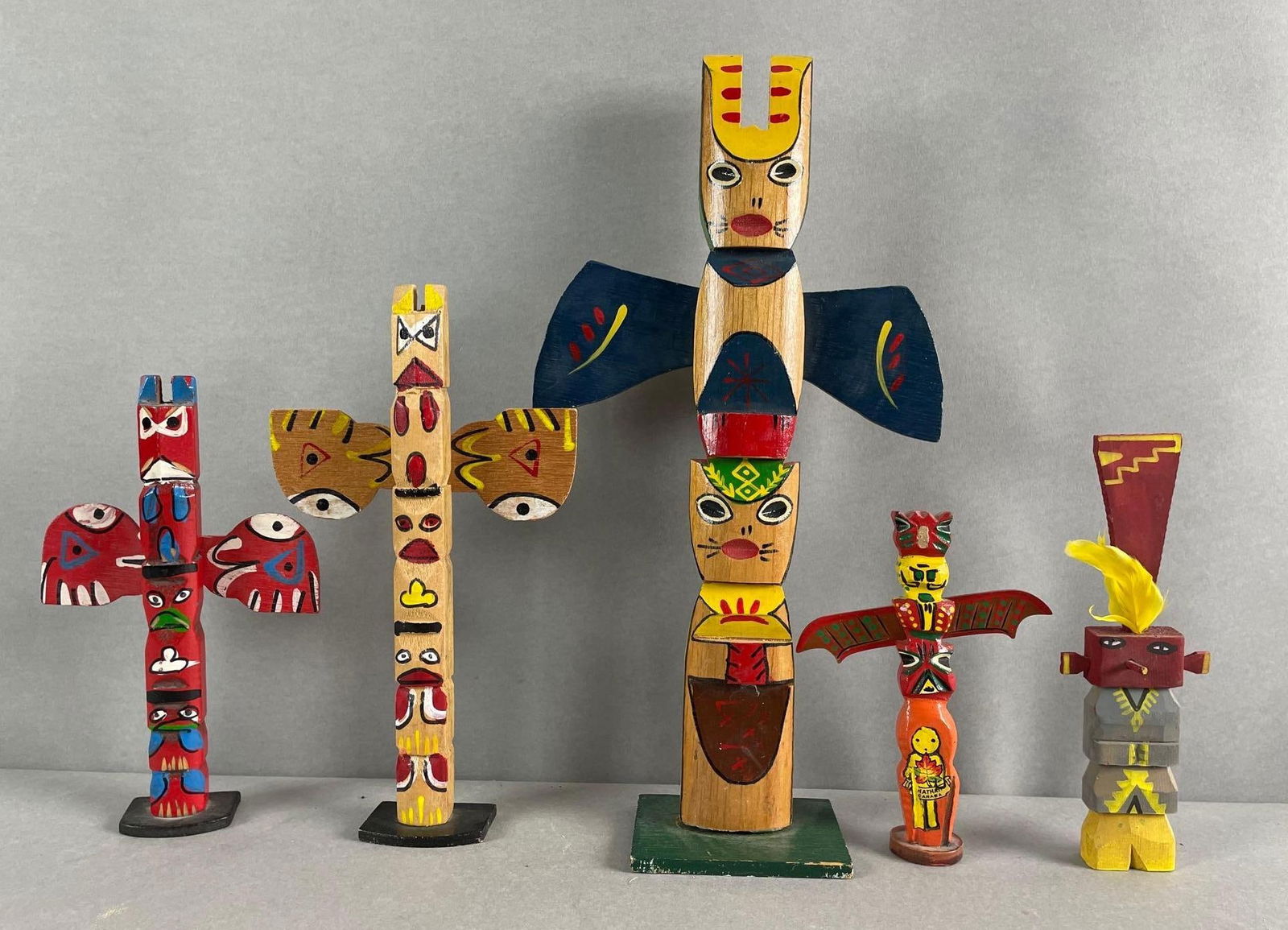 Group of 5 Native American Hand Painted Totem Poles (1 of 3)