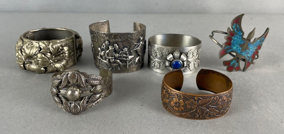 Group of 6 Metal Cuff Bracelets: Largest measures 2 x 3 inches