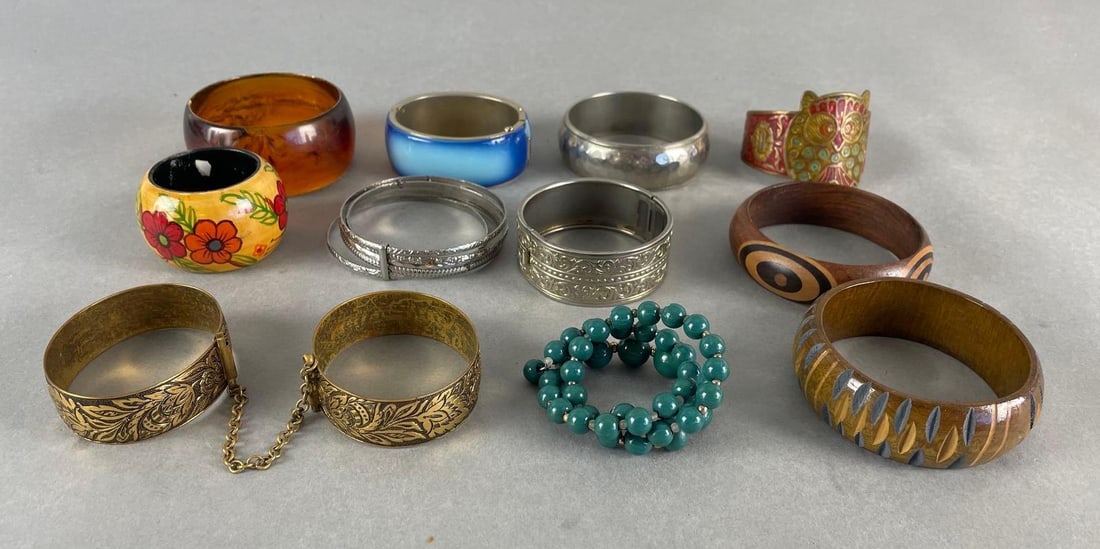 Group of 15 Cuff Bracelets: Includes napkin ring. Largest measures 3 x 1 1/4 inches
