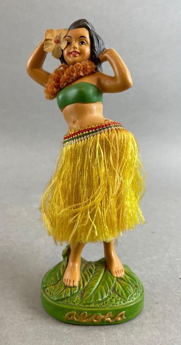 Hawaiian Hula Girl Dancing Dashboard Ornament: Made in Japan, ceramic. Measures 6 3/4 inches tall