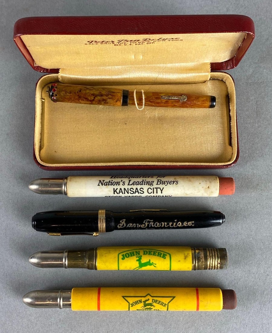 Group of 5 Fountain Pens and Advertising Bullet Pencils - John Deere and Others: Includes Peter Pan Deluxe fountain pen, John Deere Josephson and Son Princeton Illinois pencils, Kansas City Stock Yards pencil, and San Francisco Fountain Pen, One with Case, Case measures 4 x 2 x 3/