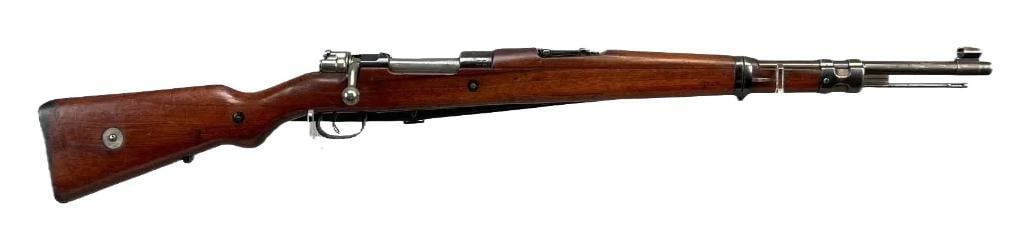 Scarce Mauser Chilean Contract Model 1935 7x57mm cal. Bolt Action Carbine: Serial Number of 5182 Matching Throughout. This a very nice example of a pre-war Mauser rifle, these were produced prior to WWII under contract for the country of Chile. The top of the receiver has th