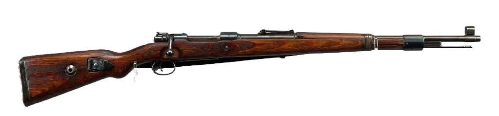 WW2 German Mauser K98 8mm Mauser Bolt Action Rifle: Serial Number 10641b, Waffenamt Marks Throughout, Serial Number Matches on everything but the barrel, Clean Bore with Rifling Present, Good to Very Good Condition